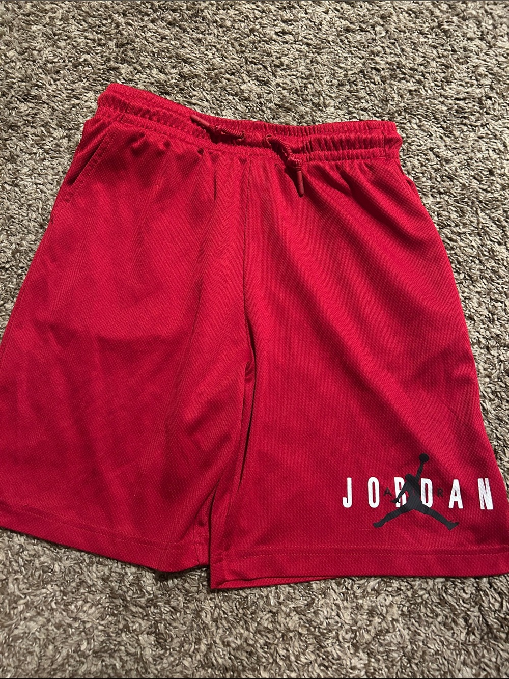 Jordan Red Mesh Athletic Shorts with Black Jumpman